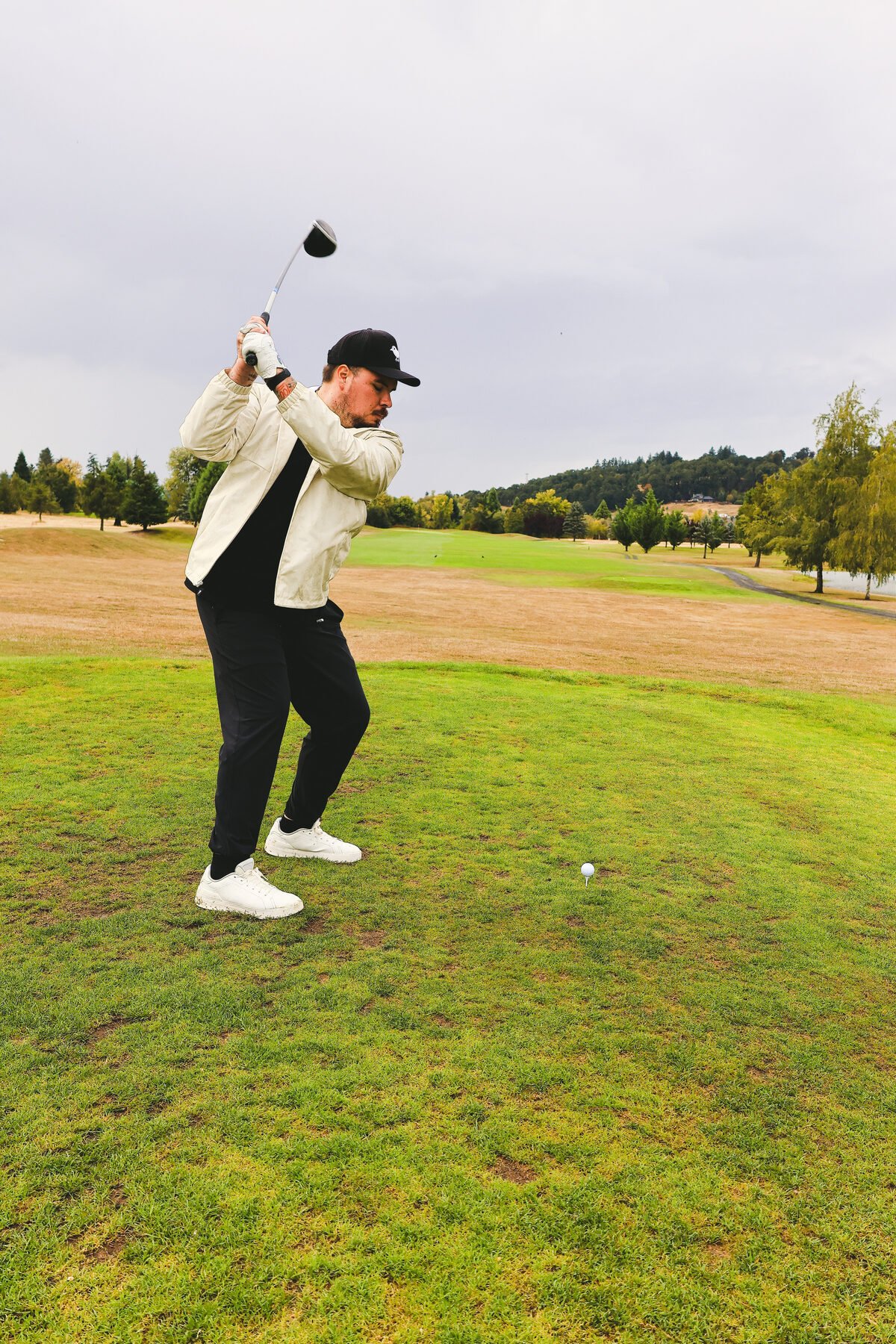 Follow through on the tee box, ball still in frame