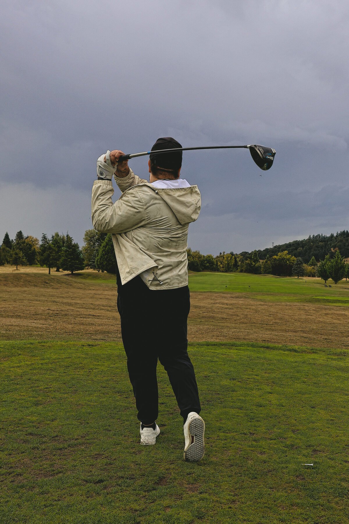 Driver through impact, weight already forward
